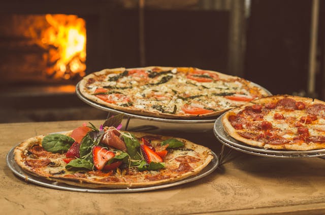 Pizza Ovens and Bird Feeders: Creating a Garden Full of Flavor and Life